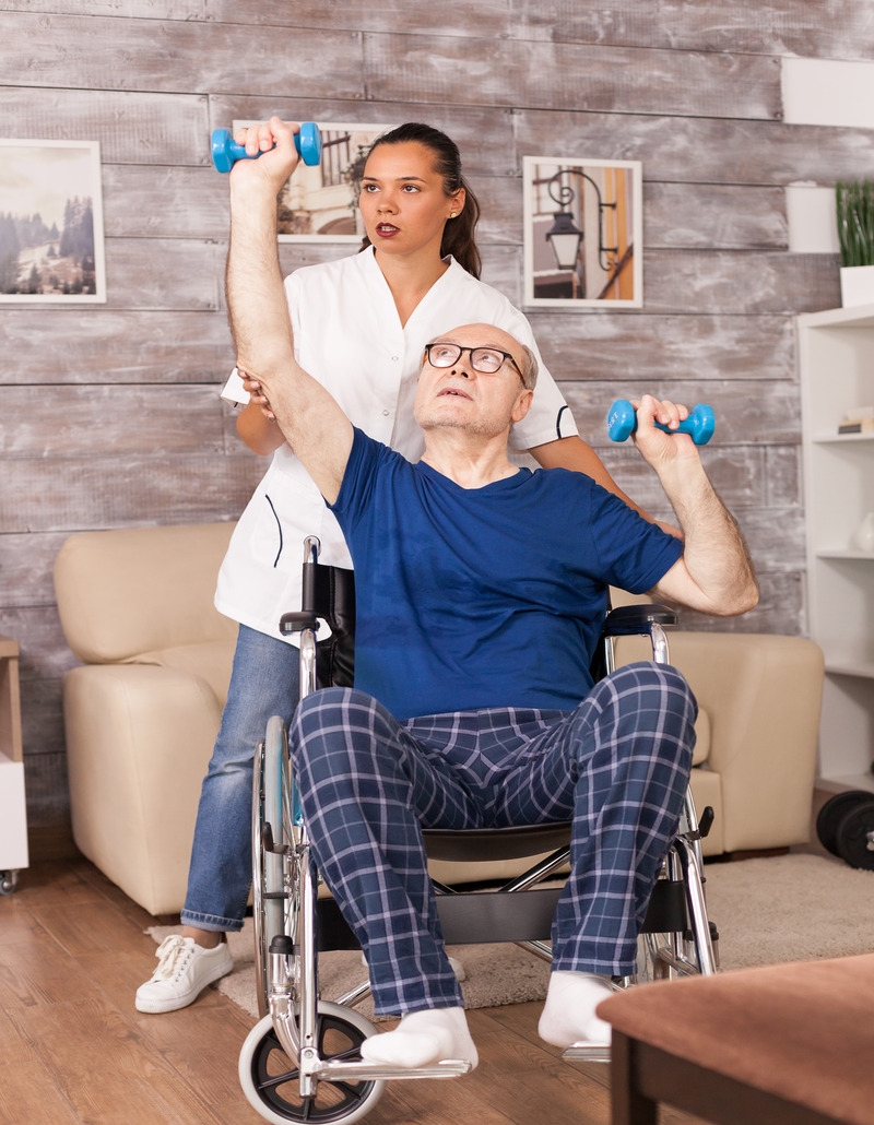 Elderly person performing physiotherapy exercises
