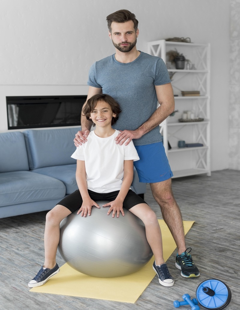 Pediatric physiotherapy exercises with a child